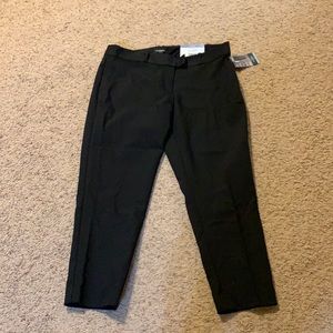 Cute, brand new black capris. NWT. Never worn.
